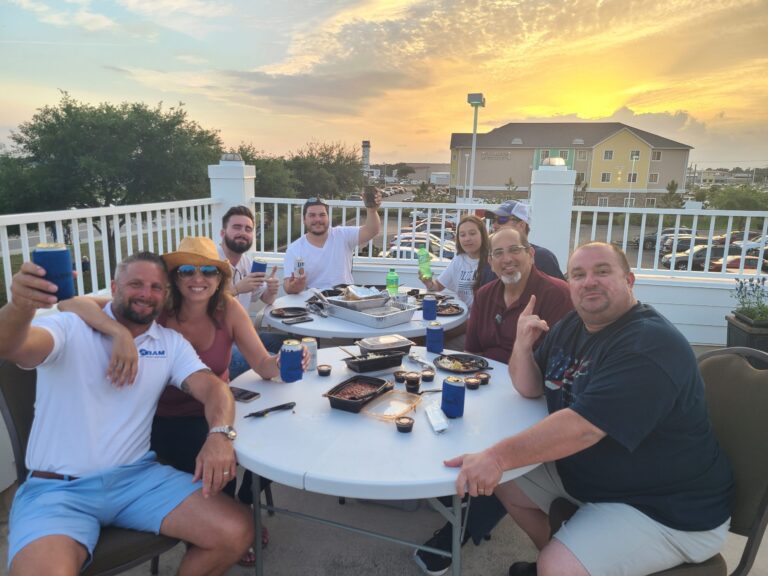 BAM personnel having lunch on second-floor balcony